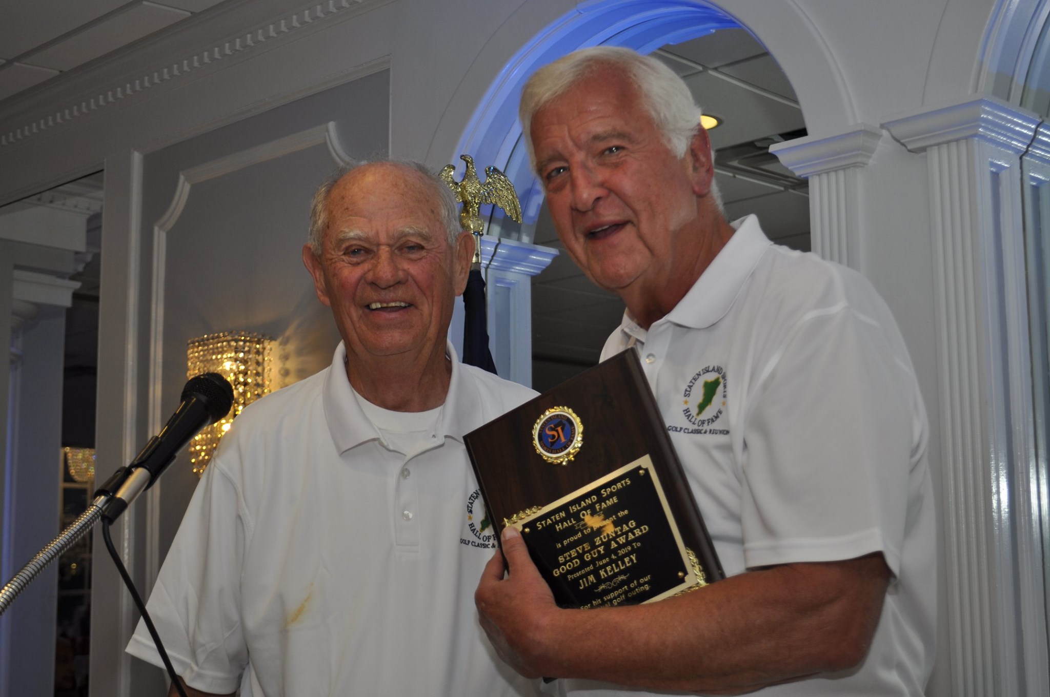 Good Guy Award winner Jim Kelley (right), with golf chairman John Woodman Sr. (left)