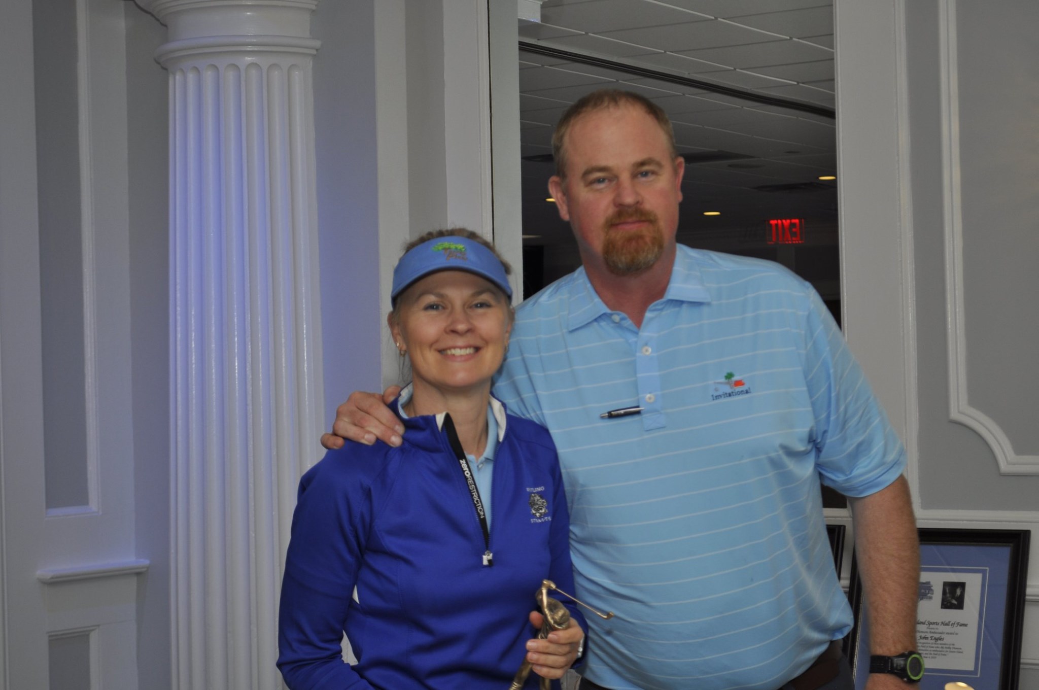 John Woodman Jr. with his sister, Suzzane, winner of the distaff longest drive competition.