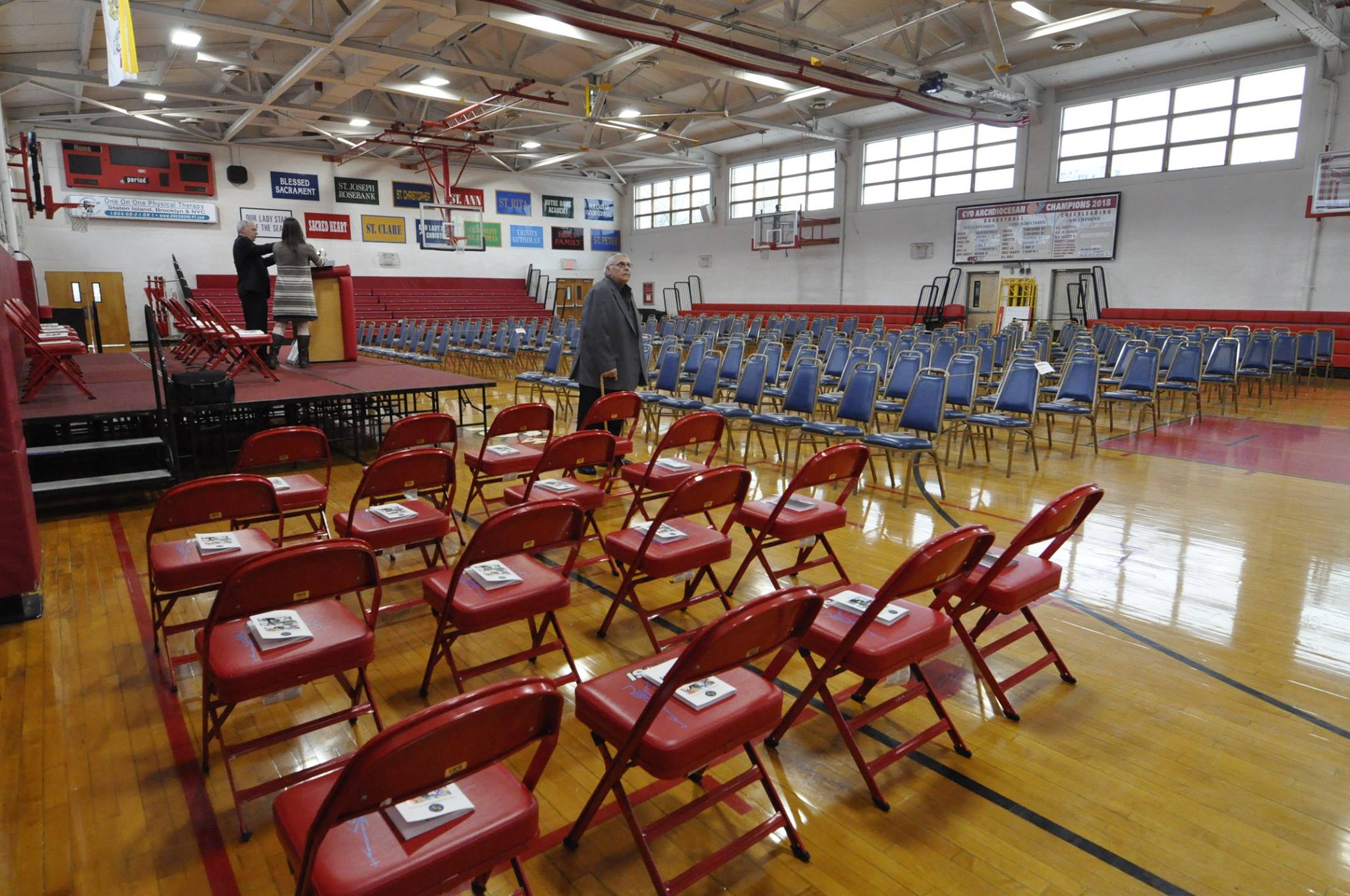 Setting up the gymnasium at Mount Loretto in Staten Island for the Staten Island Sports Hall of Fame 2019 Induction Ceremony