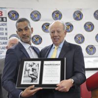 Bobby Rodriguez receiving her plaque for induction to the Staten Island Sports Hall of Fame in 2019